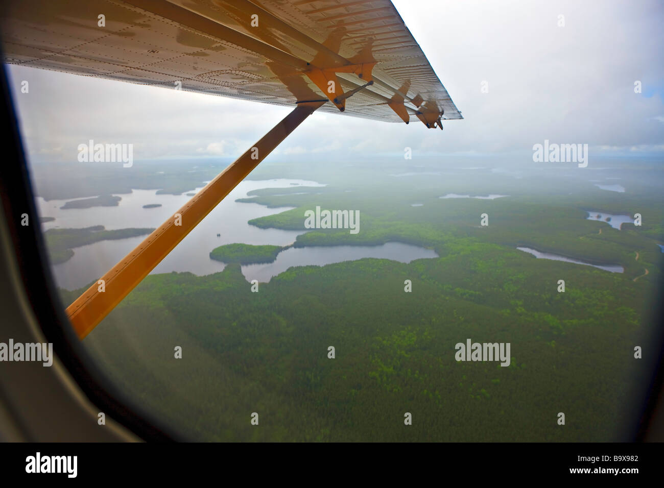 Aerial view of lakes,Islands and forest of Northern Ontario during a flight in a De Havilland DHC-3 Otter aircraft. Stock Photo