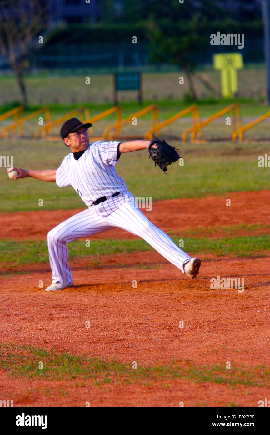 Baseball player preparing to throw ball Stock Photo Alamy