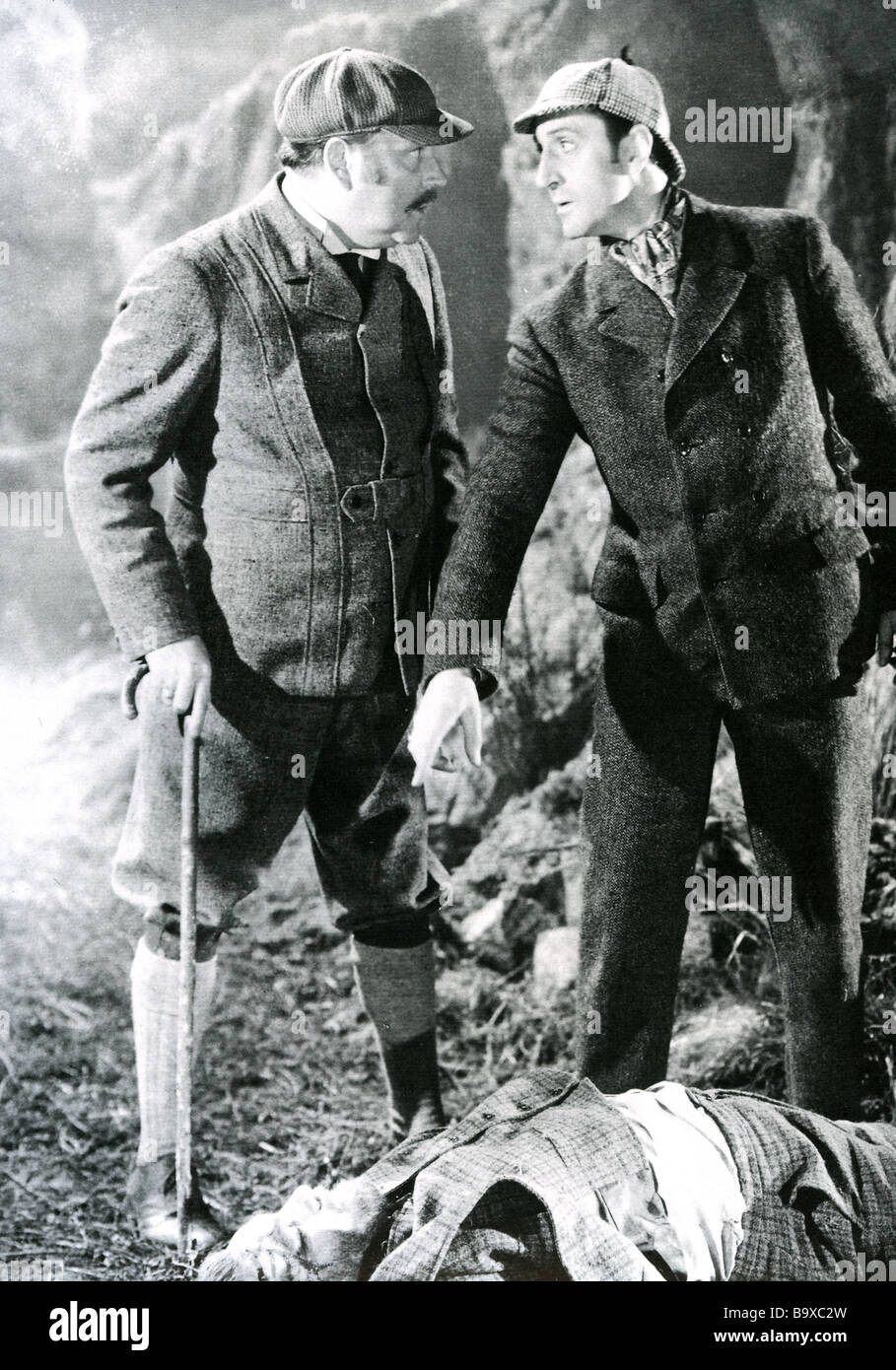 THE HOUND OF THE BASKERVILLES 1939 TCF film with Nigel Bruce at left as Dr Watson and Basil Rathbone as Sherlock Holmes Stock Photo