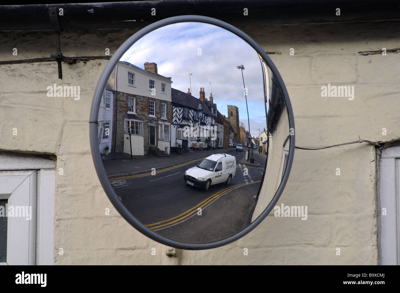Convex mirror in street, UK Stock Photo Alamy