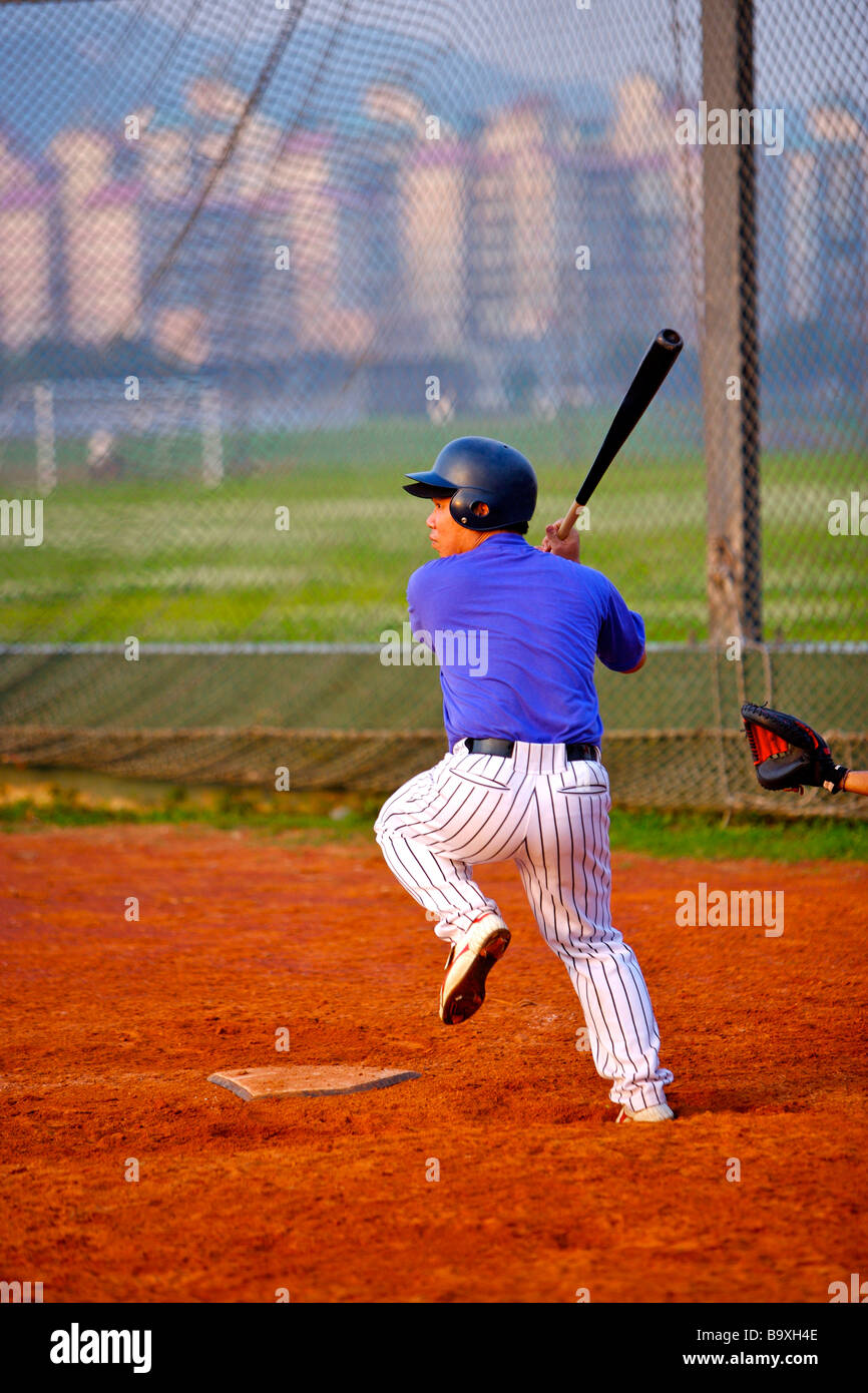 Baseball player swing bat Stock Photo Alamy