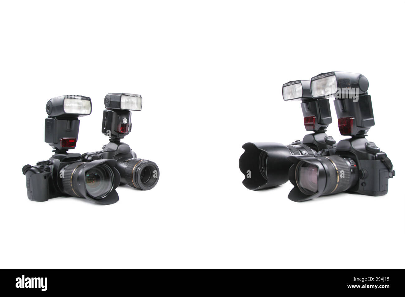 Cameras with flashes on white background Stock Photo - Alamy