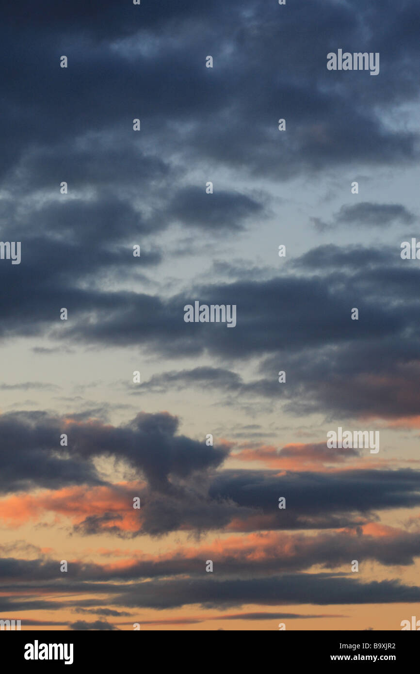 Evening dusk sky sunset with dark clouds Stock Photo