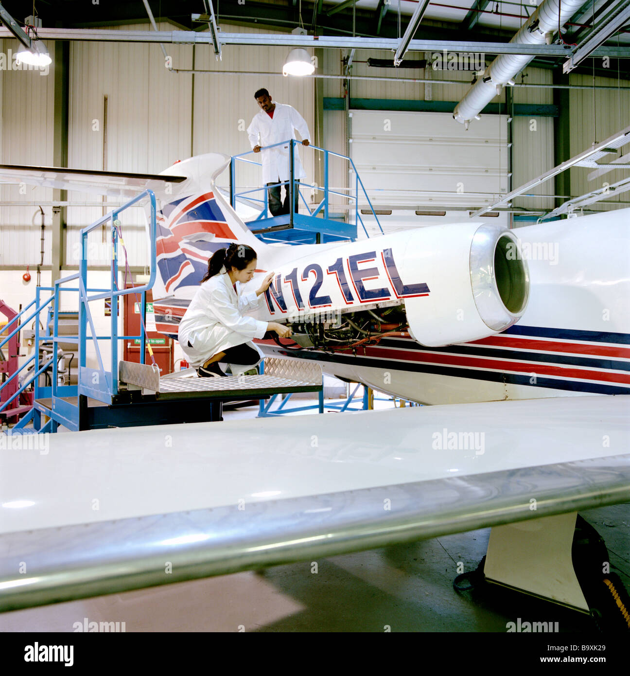 An aeronautical engineer applies scientific and technological principles to research, design, maintain, test and development Stock Photo