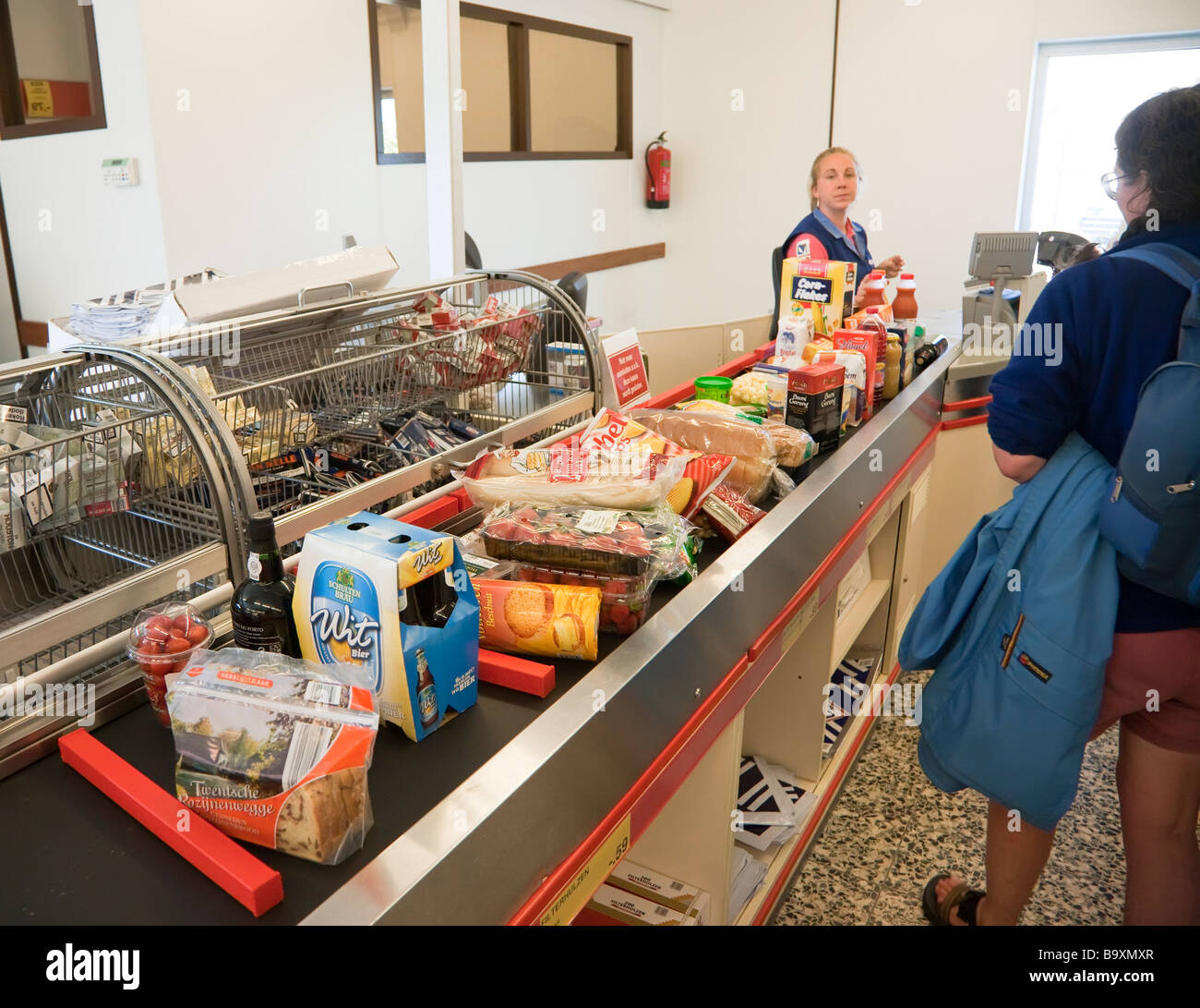 Food on conveyor belt in supermarket Netherlands Stock Photo Alamy