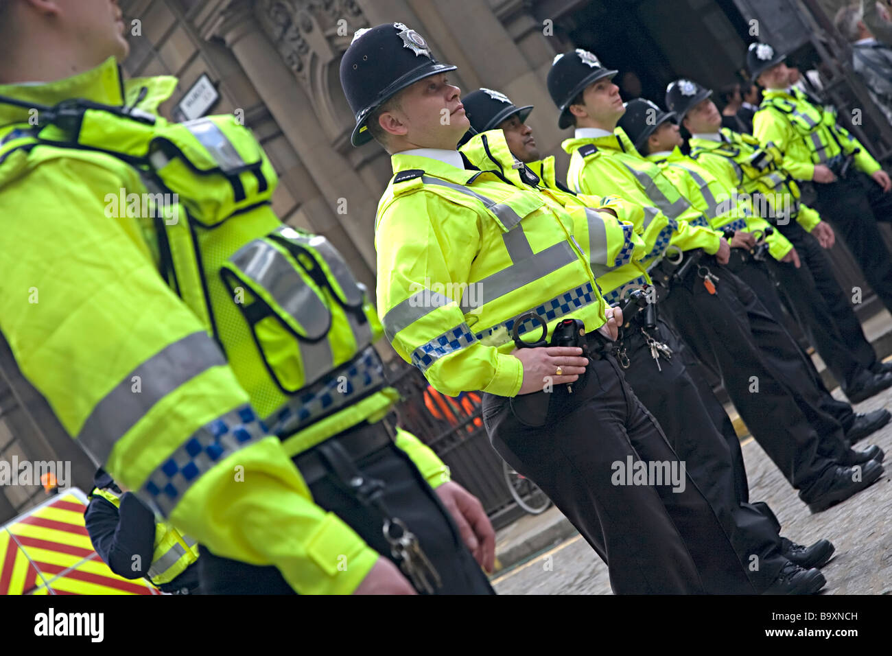 A line of British policemen during the g20 protests, London UK Stock Photo