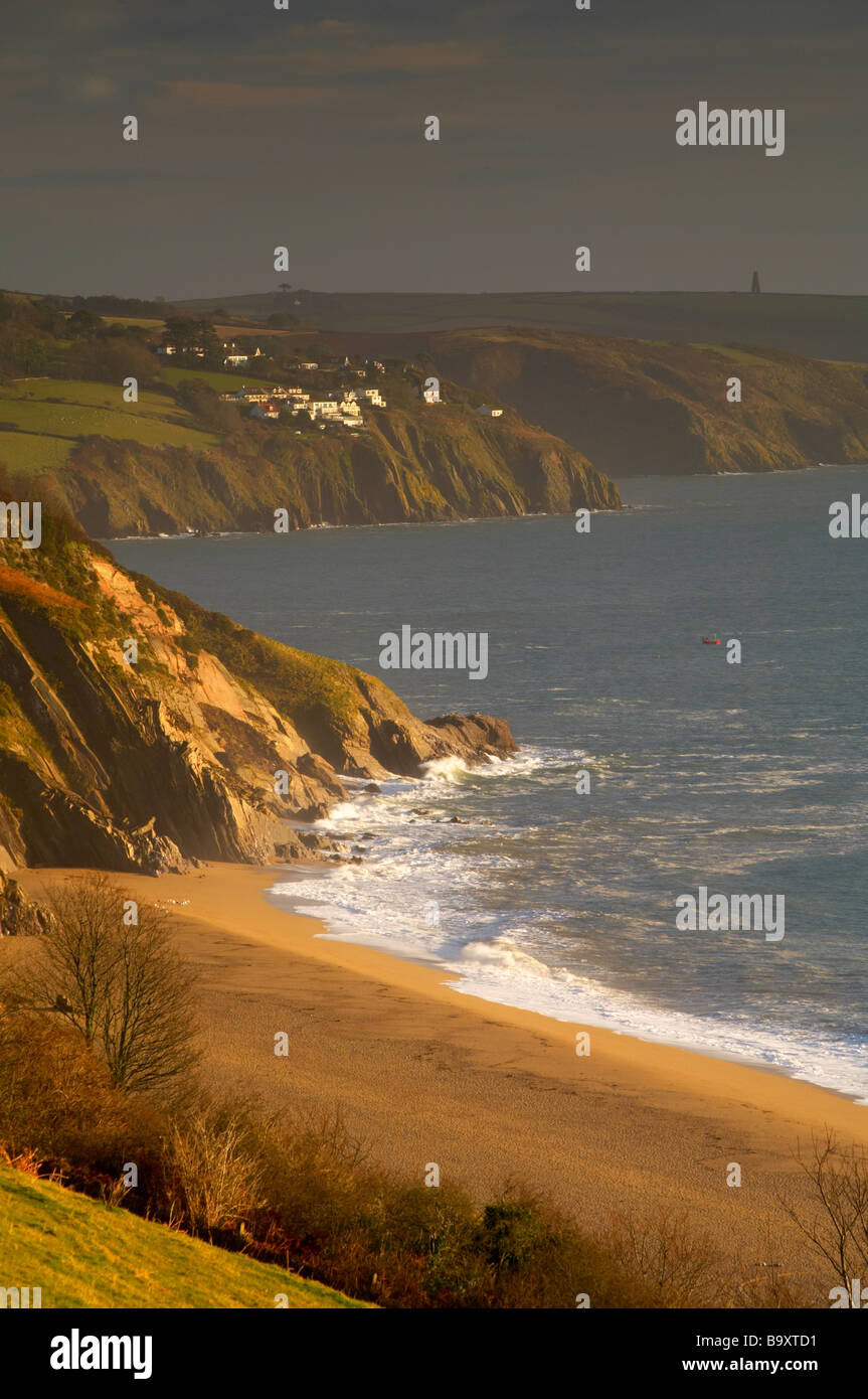 Waves crashing into the beach at Slapton at dawn Devon UK Stock Photo