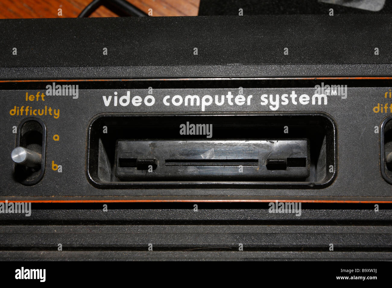 Atari video game console video computer system cartridge opening and difficulty selector switch. Stock Photo