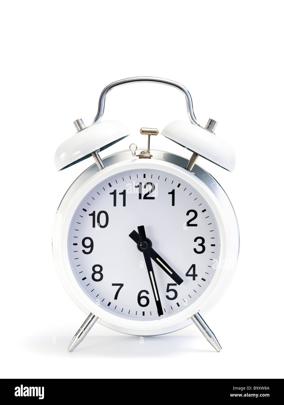 classic white double bell alarm clock isolated on white background