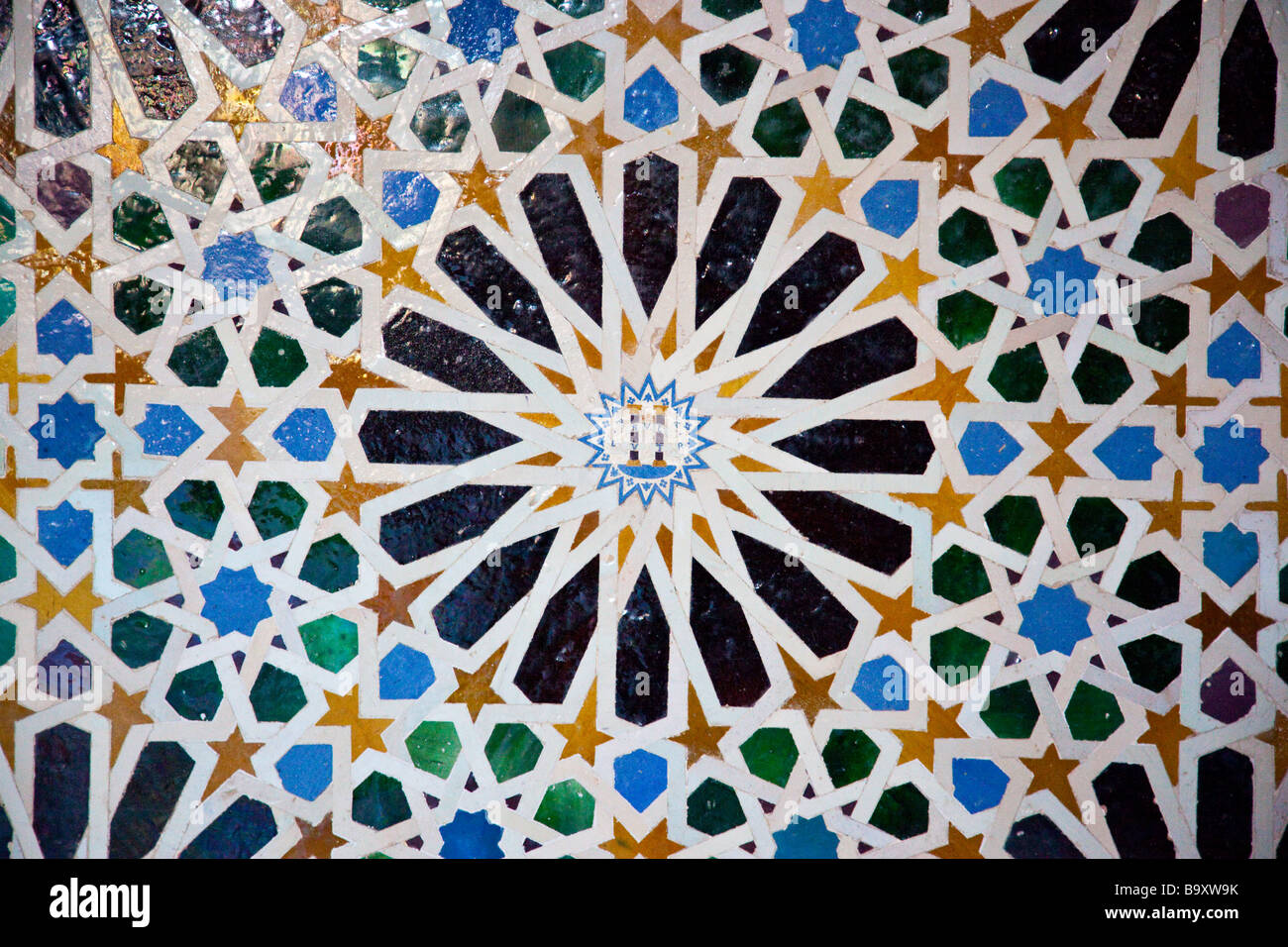 Islamic Architectural Detail Pattern in the Mexuar inside the Nasrid Palace in the Alhambra in Granada Spain Stock Photo