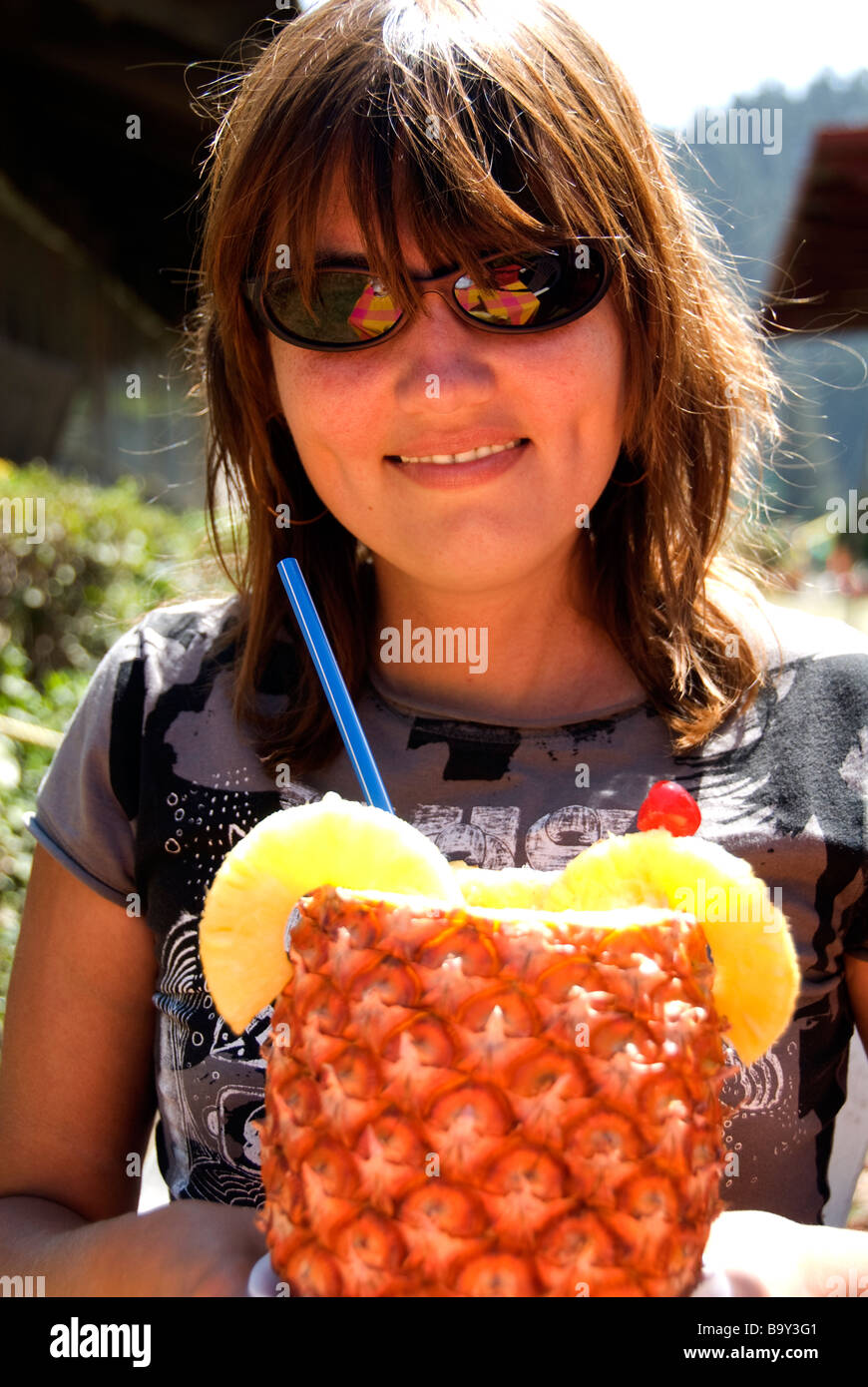 a woman with a cocktail