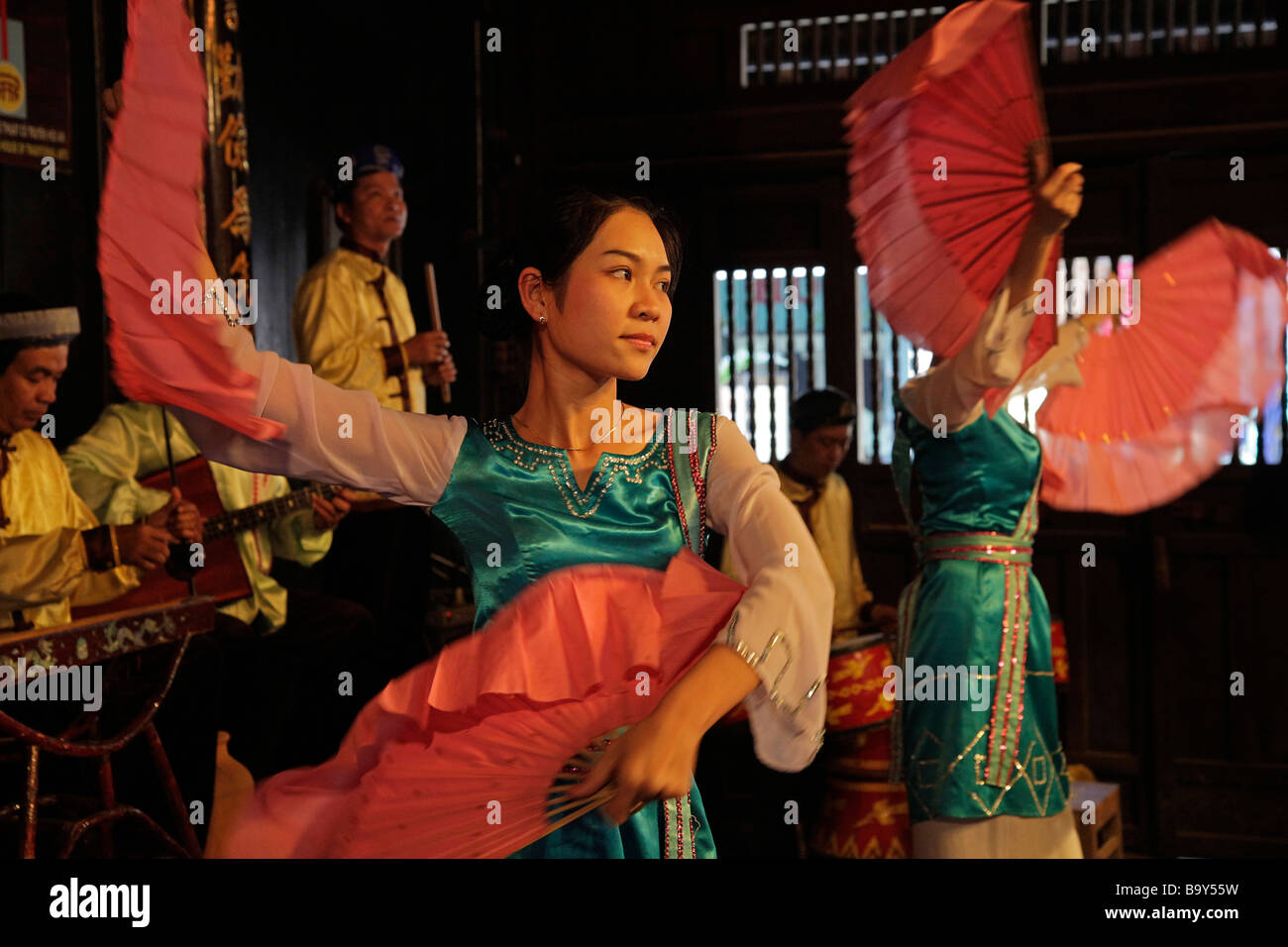 Folk songs folk with traditional costumes instruments in hoi an hires