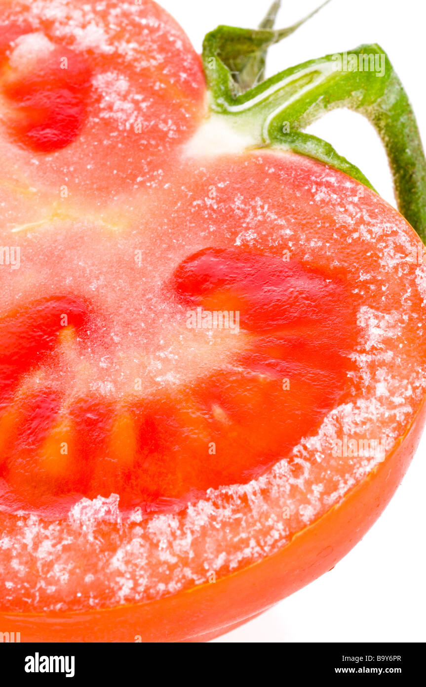 frozen fresh tomato Stock Photo Alamy