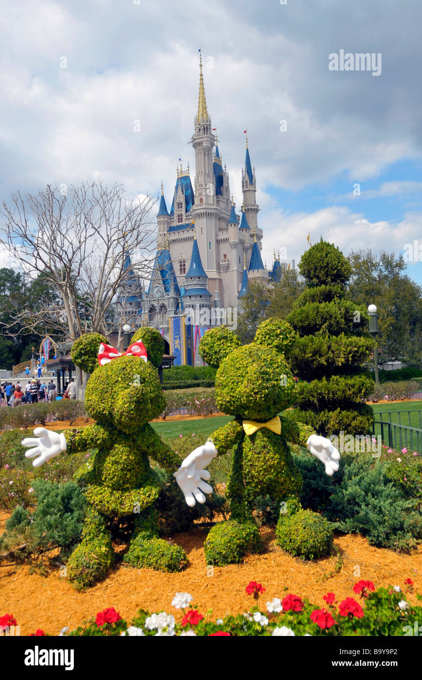 Topiaries of Mickey and Minnie Mouse at Walt Disney Magic Kingdom Theme Park Orlando Florida Central Stock Photo
