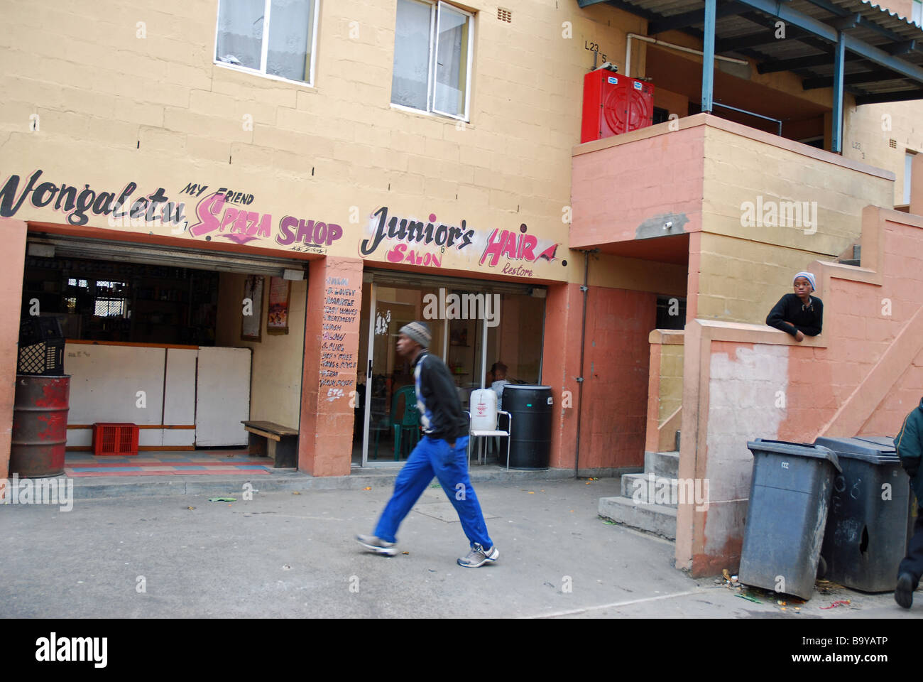 A Spaza Shop And Hair Salon Next Door To Each Other In The Ground