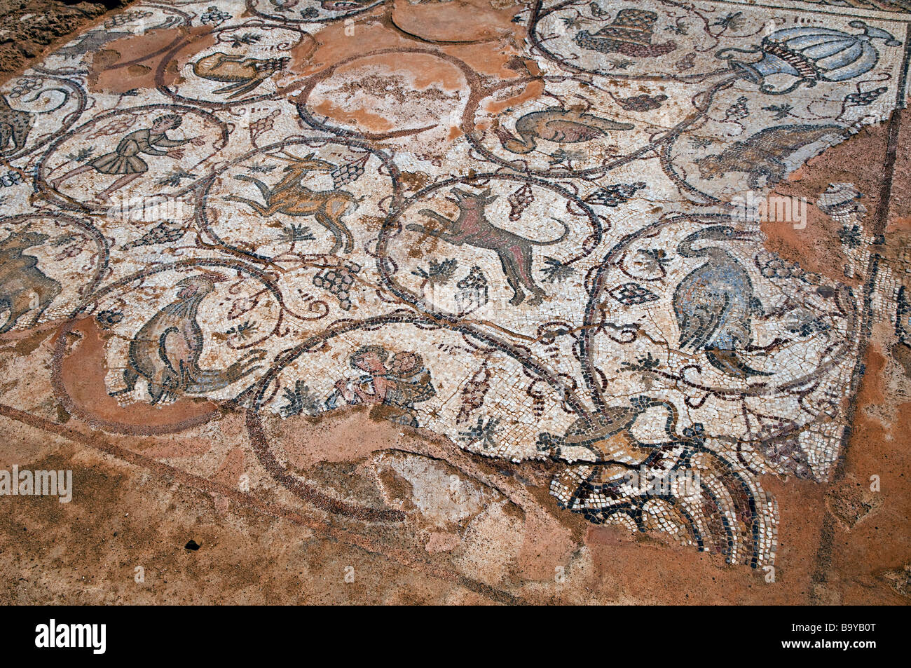 Figurative ancient floor mosaic depicting birds and animals in Caesarea national park Israel Stock Photo