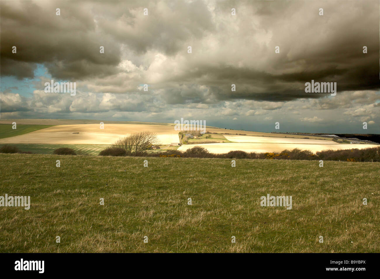 Stormy sky over arable farmland, South Downs, Sussex, England Stock Photo