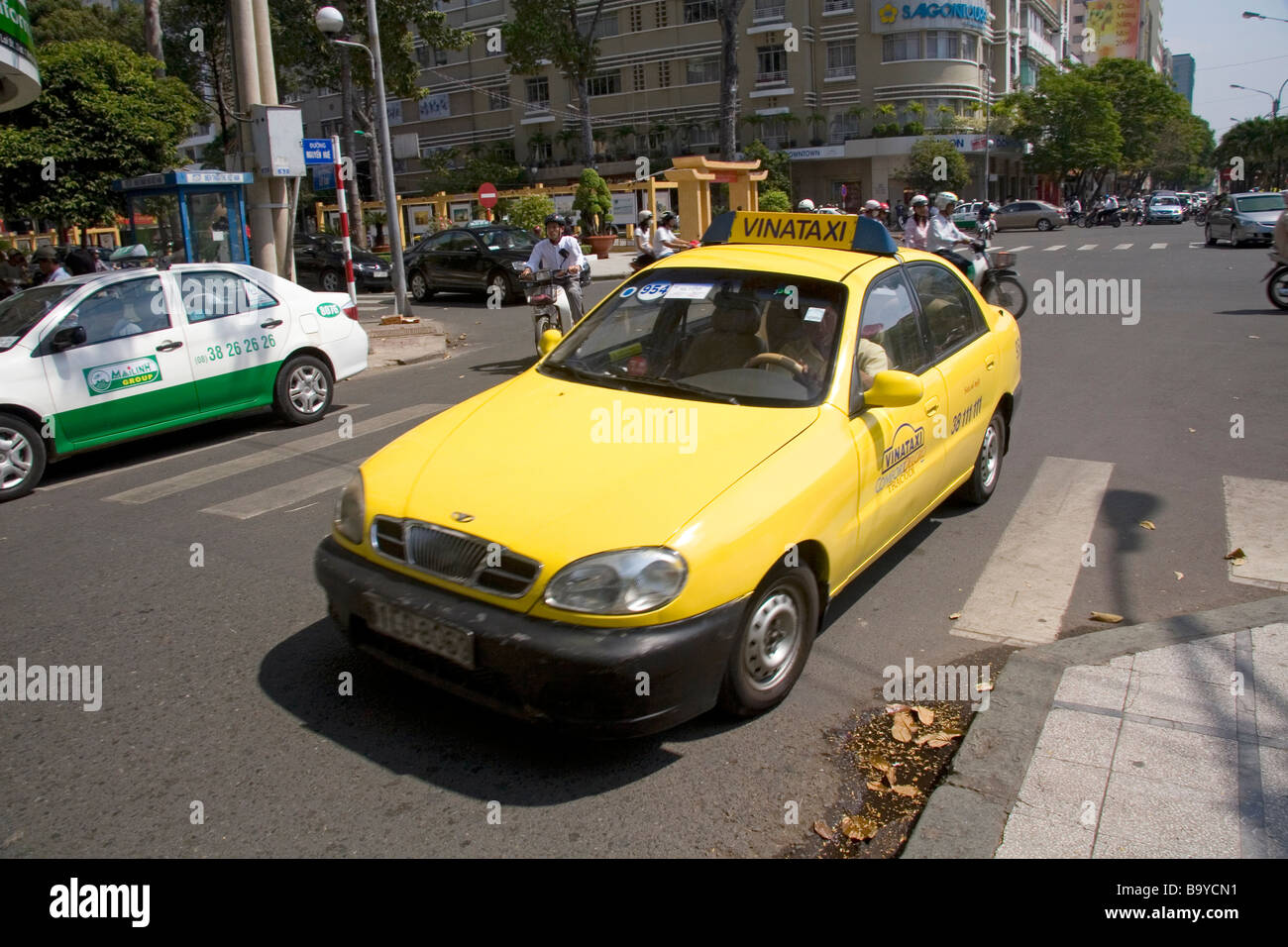 Taxi cab on the street in Ho Chi Minh City Vietnam Stock Photo