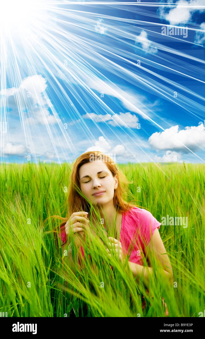girl in the field against the sky Stock Photo - Alamy