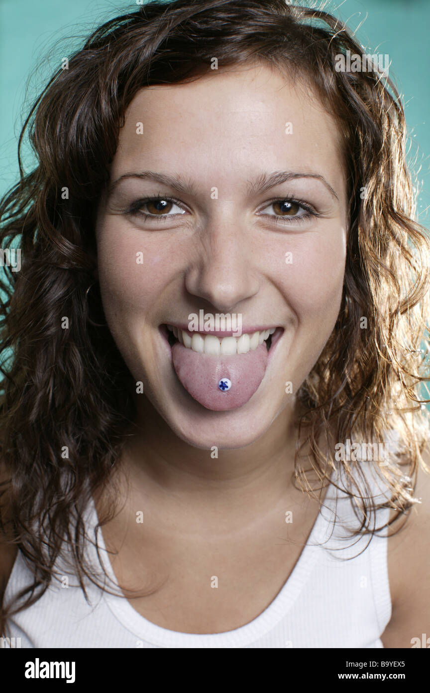 Teenager with tongue piercing hi-res stock photography and images - Alamy