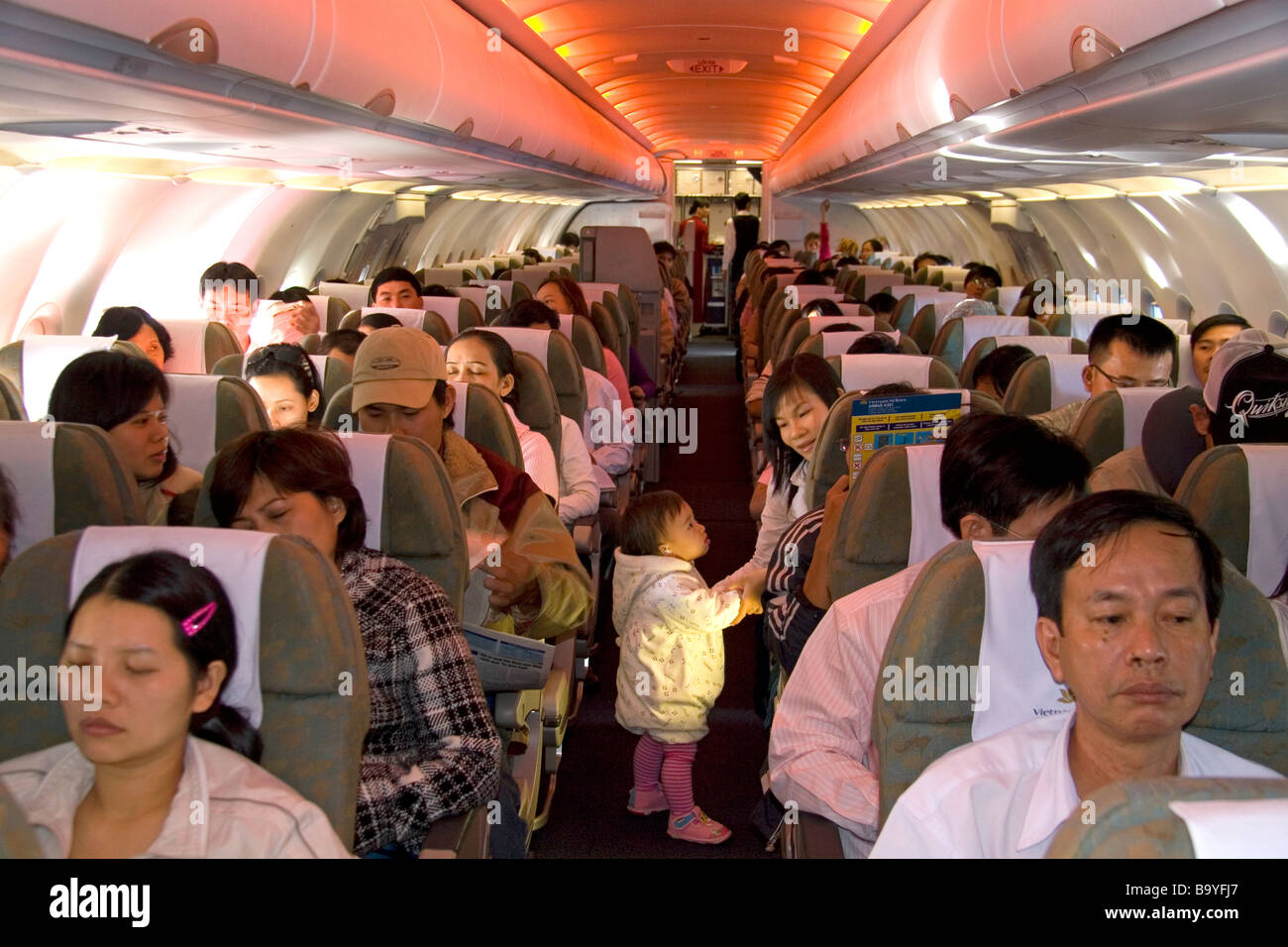 Airplane passengers hi-res stock photography and images - Alamy