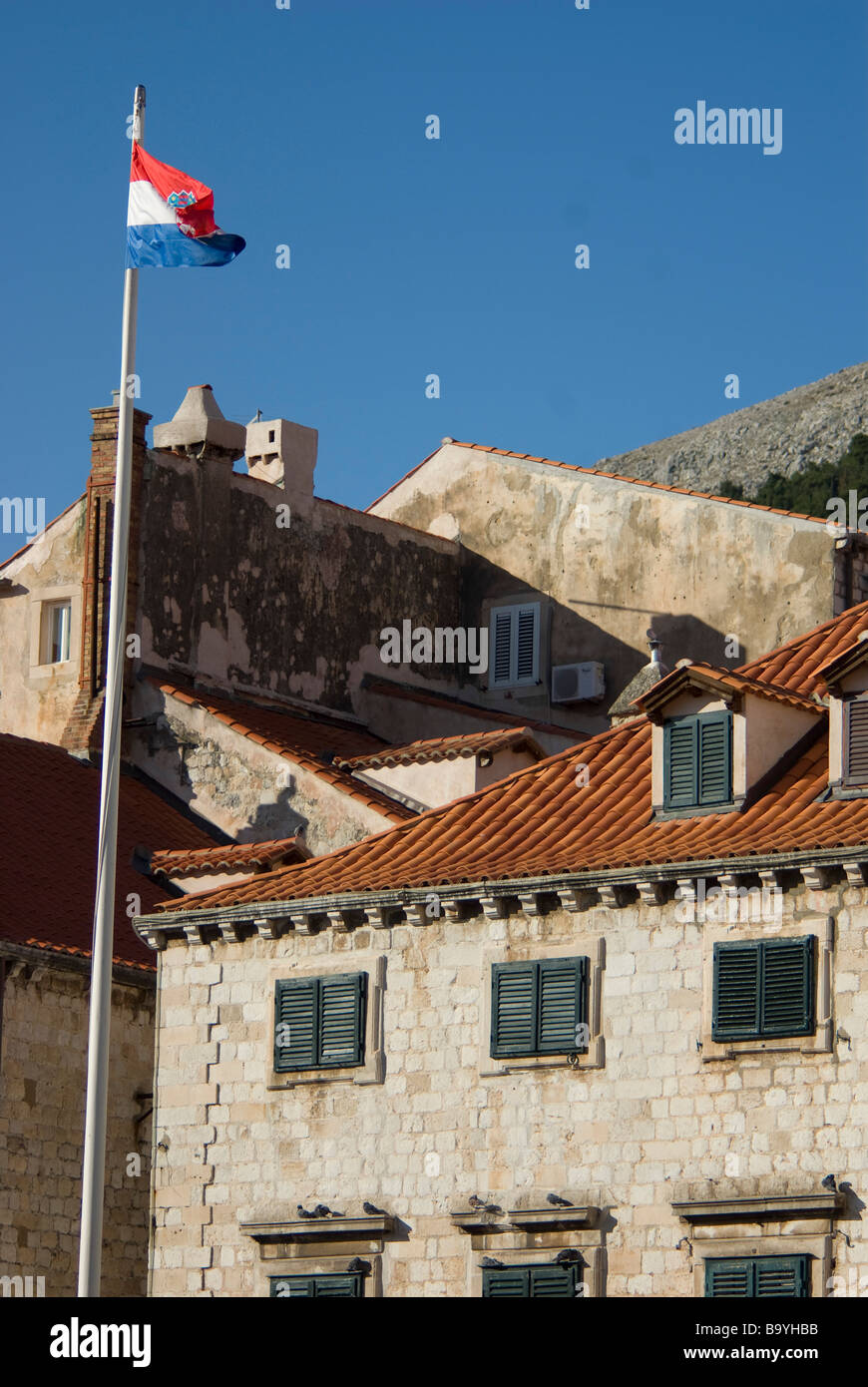 Apartment and croatian flag on Placa Stradun in Dubrovnik's old town