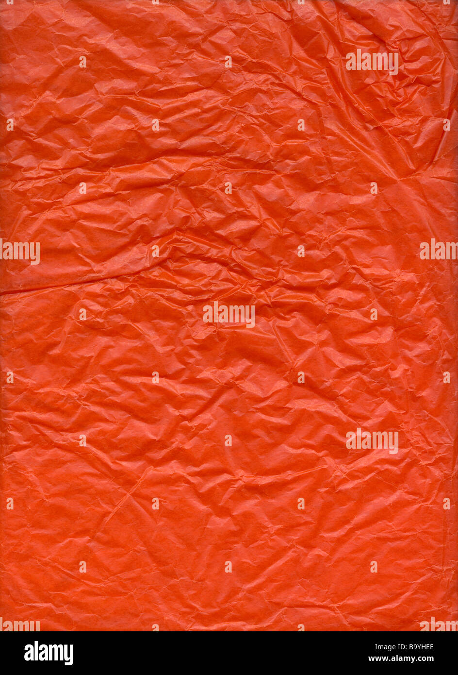 Red wrapping paper as a background Stock Photo - Alamy