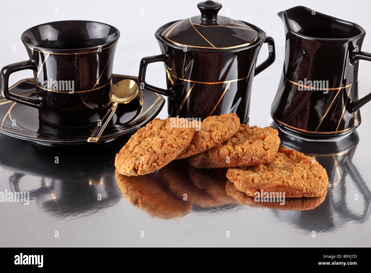 Biscuits cookies on a reflective surface ready for eating Stock Photo