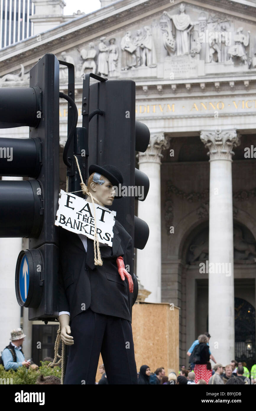 A manakin of a Banker is strung up in front of the Bank of England Stock Photo