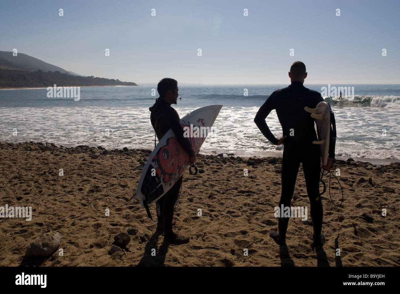 Surfers on Malibu Beach in California Stock Photo
