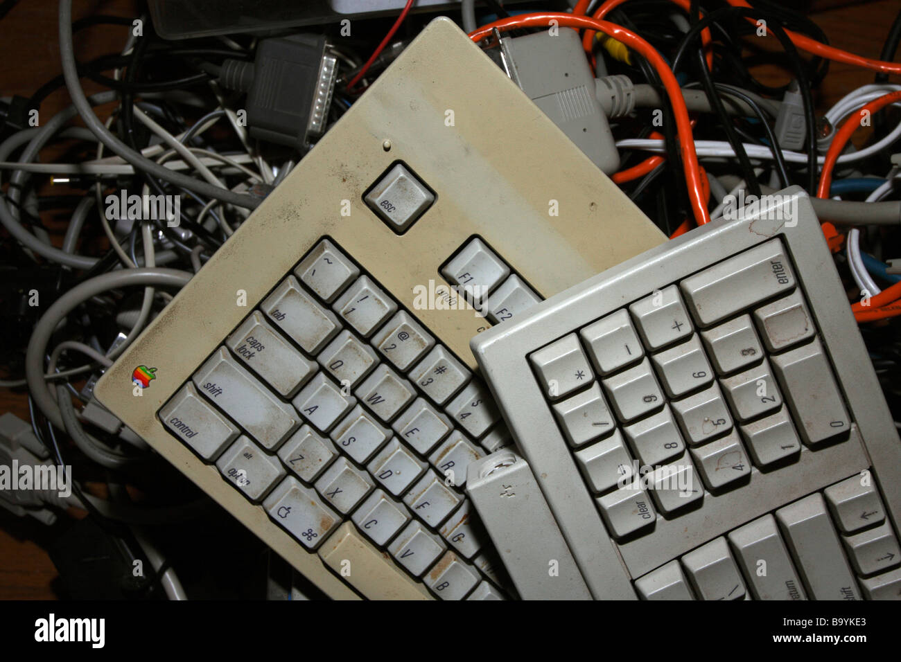 Old keyboards and wires Mac ethernet Stock Photo