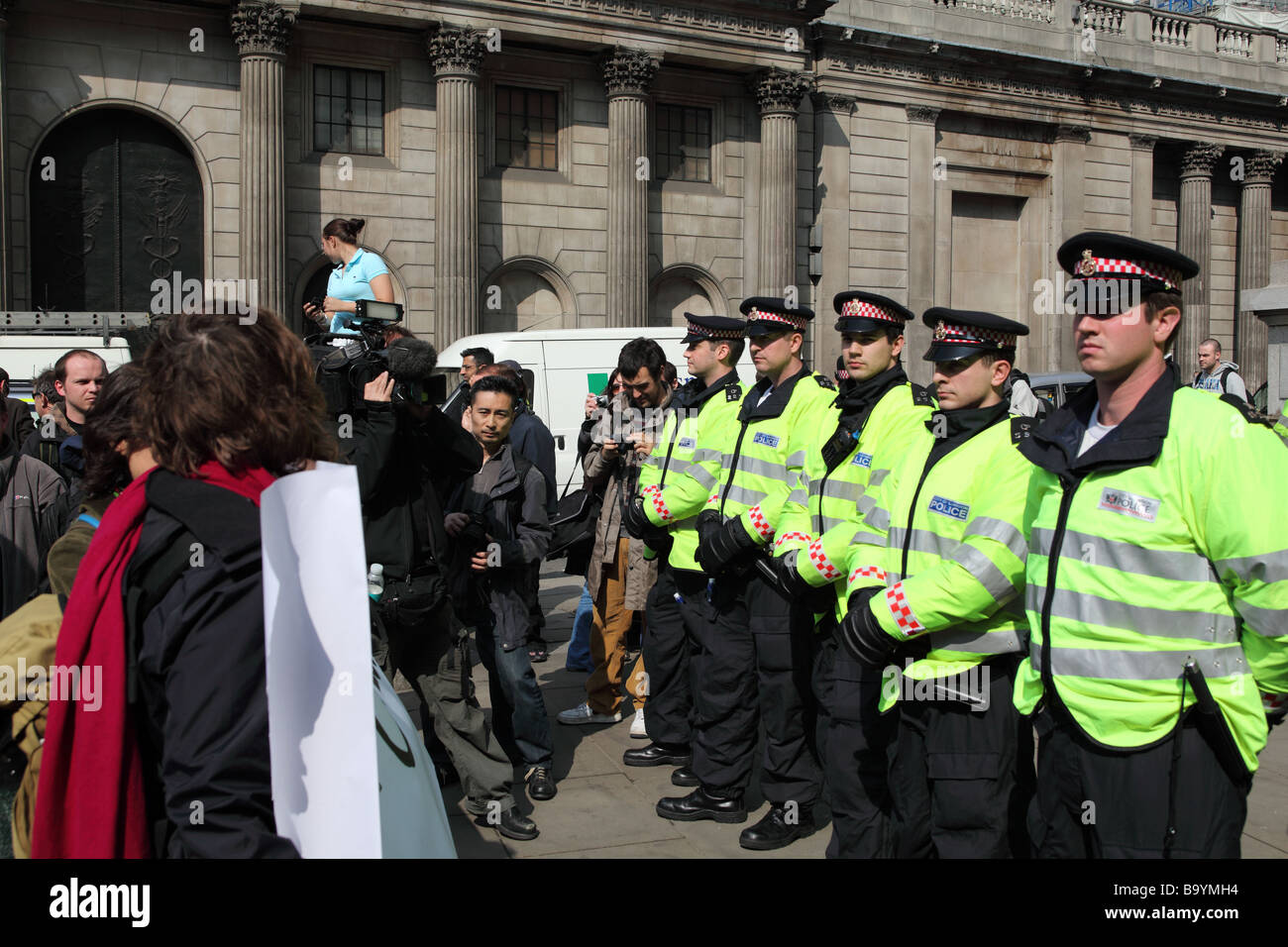 Protesters and police outside the Bank of England during the 2009 G20 summit, London, UK. Stock Photo