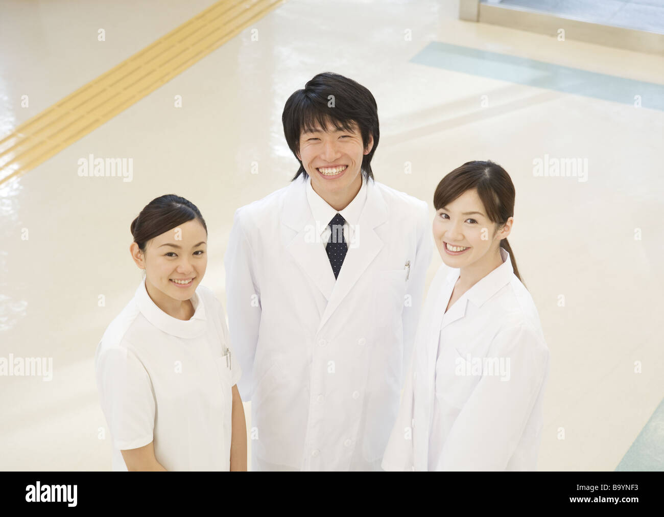 Medical team back smiling hi-res stock photography and images - Alamy