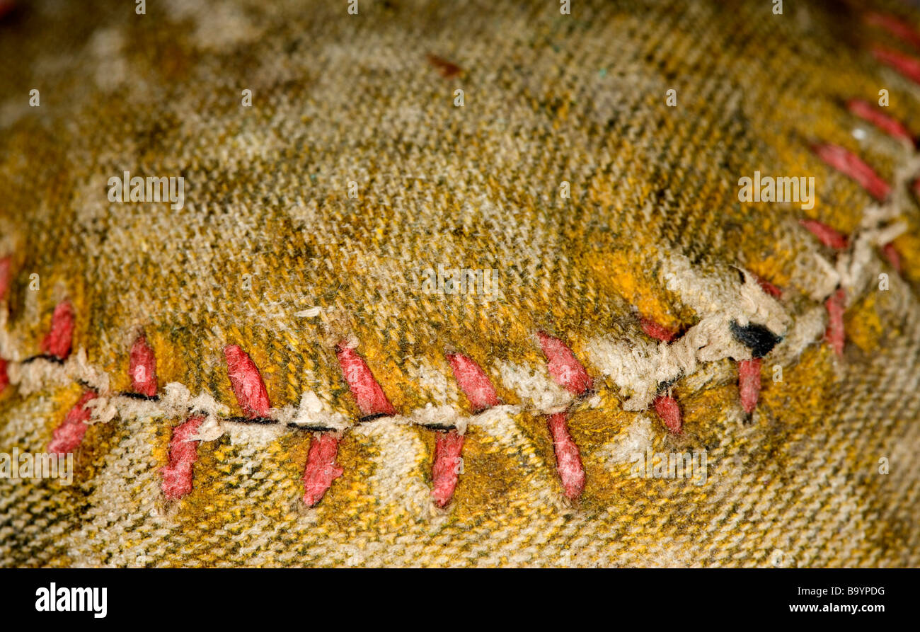 Extreme macro view of the stitches on an antique baseball. Stock Photo