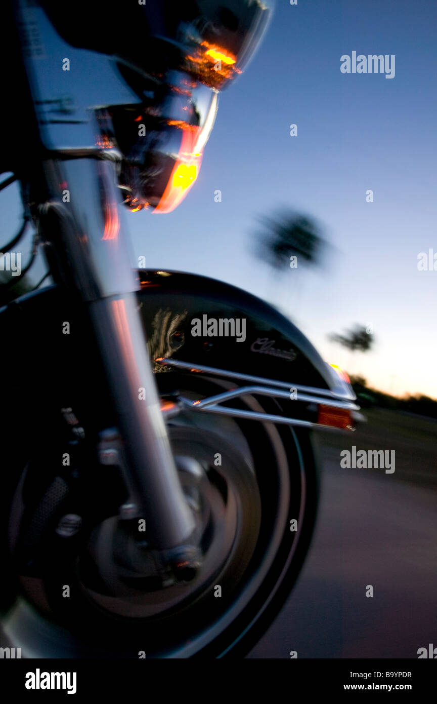 Front wheel of Harley Davidson driving down Hwy 41 near Everglades City Florida USA Stock