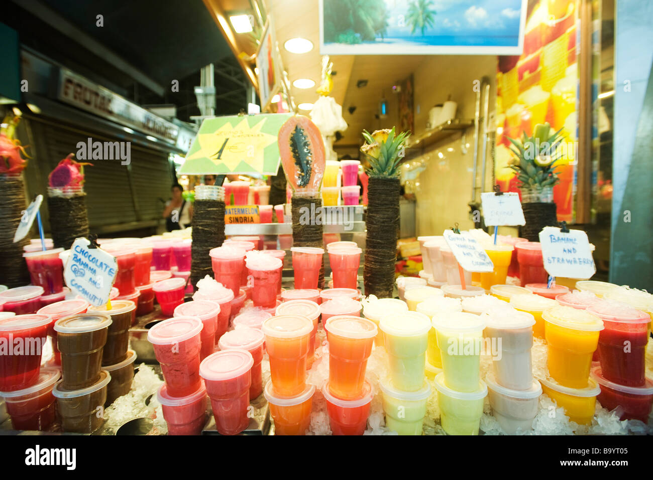 Stacked drinks display at fresh fruit juice shop Stock Photo - Alamy