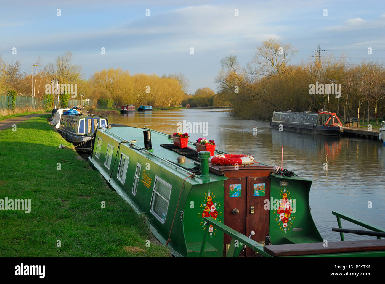 Narrowboats moored on the River Lee near Ware in Hertfordshire, England, UK Stock Photo