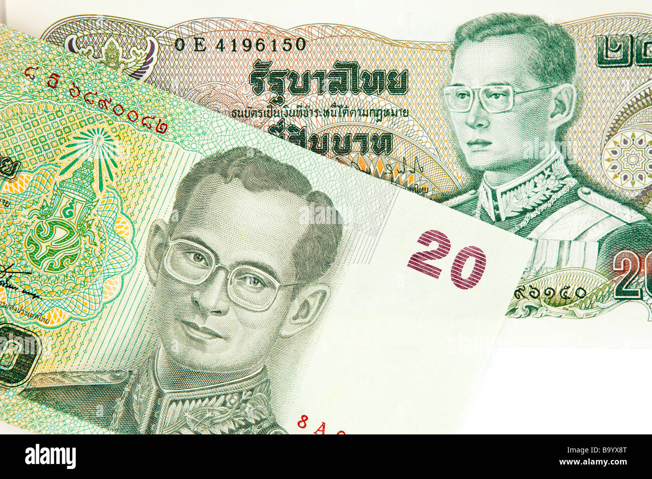 Money Thai currency detail of old and new Thailand 20 baht banknotes Stock Photo