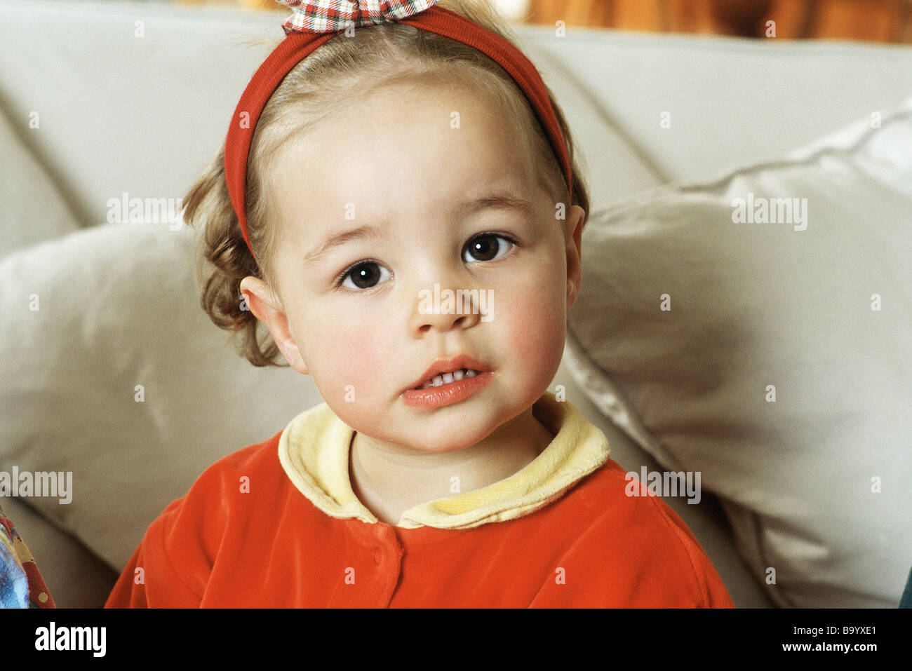 Little girl looking at camera, portrait Stock Photo - Alamy