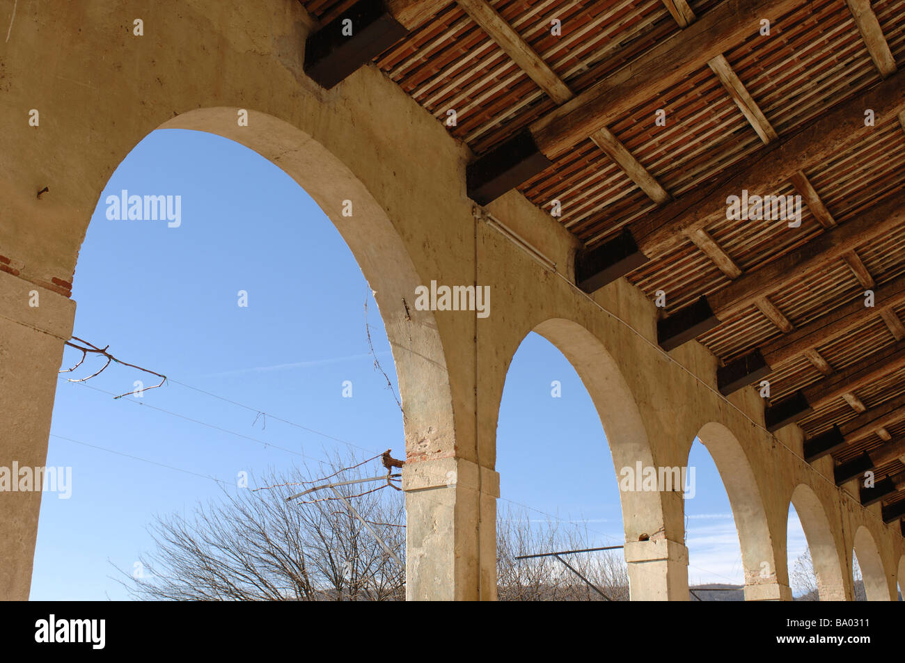 Archways on the veranda of an Italian Farm building Stock Photo