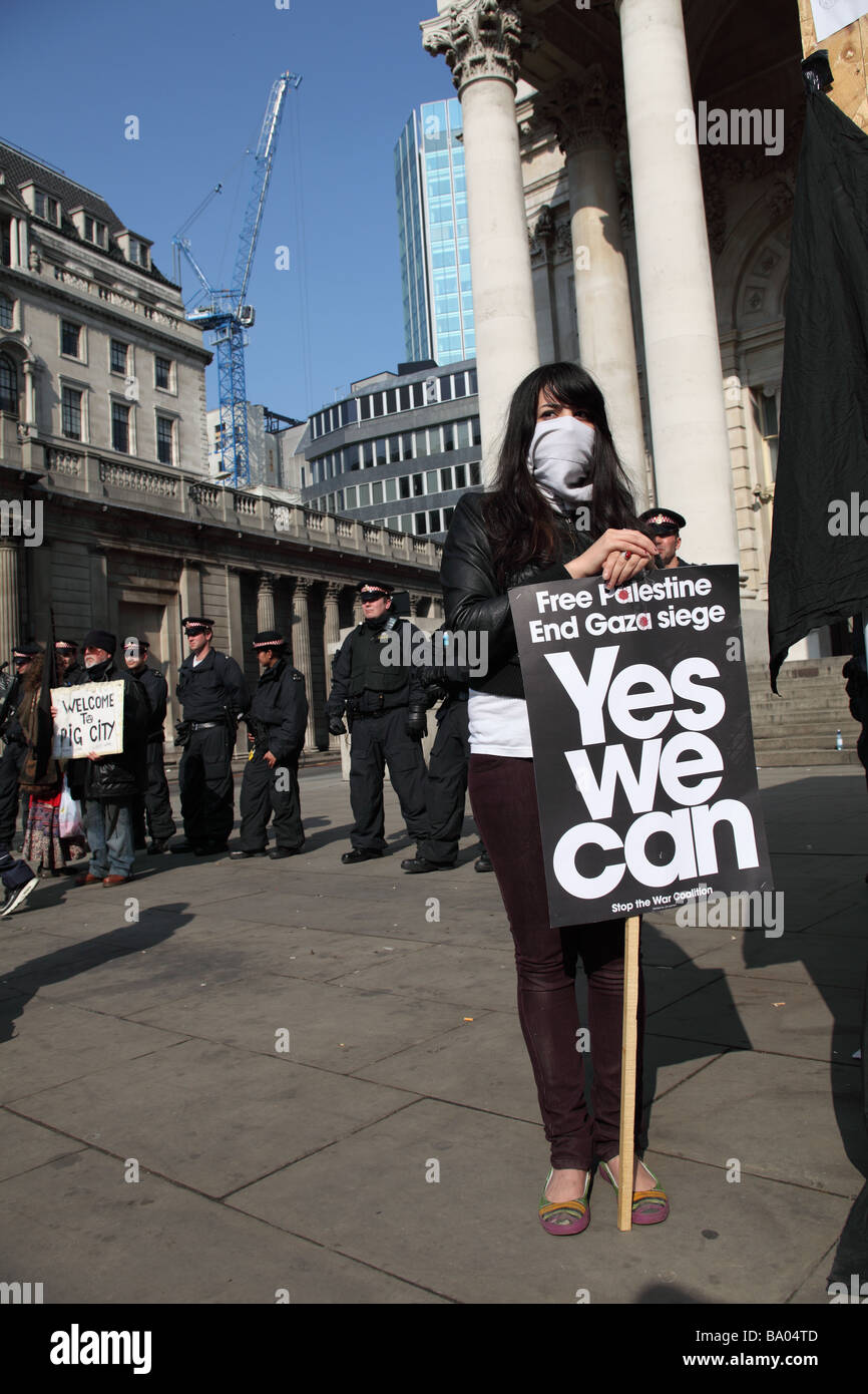 Protester with placard outside the Bank of England during the 2009 G20 summit, London, UK. Stock Photo