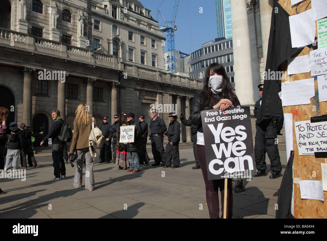 Protester with placard outside the Bank of England during the 2009 G20 summit, London, UK. Stock Photo
