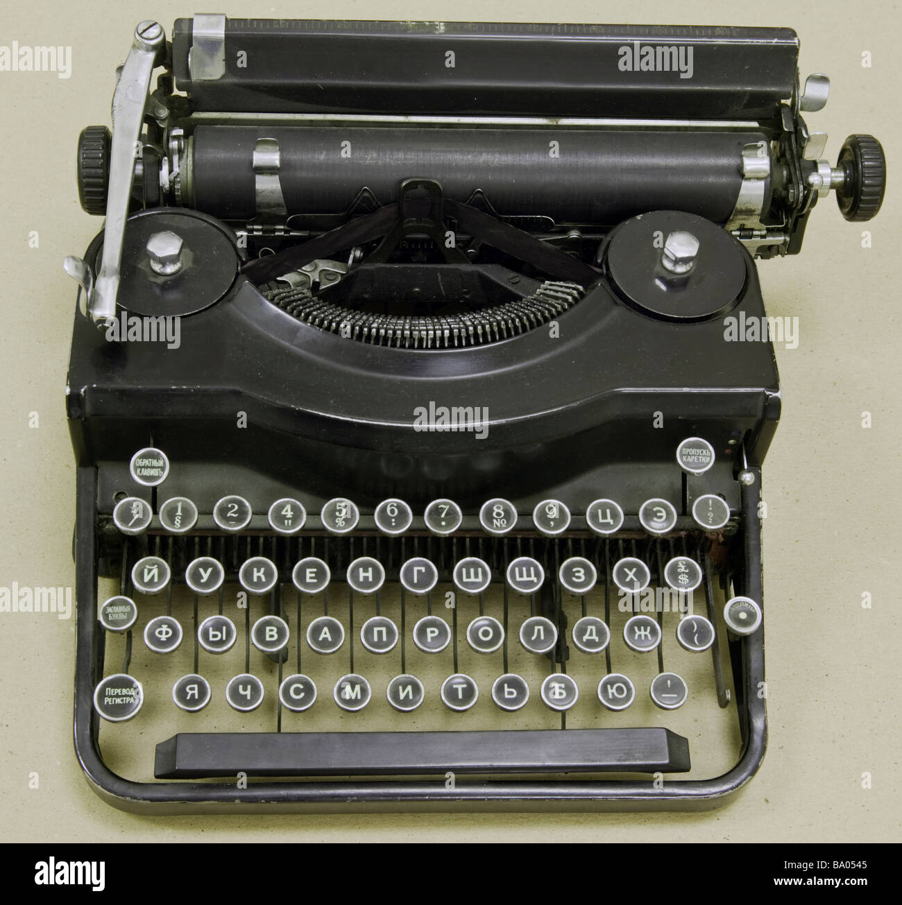 A printing press is a mechanical device for applying pressure to an