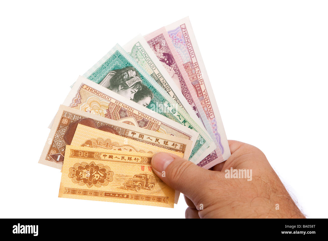 Money male hand holding handful of old Chinese currency Stock Photo