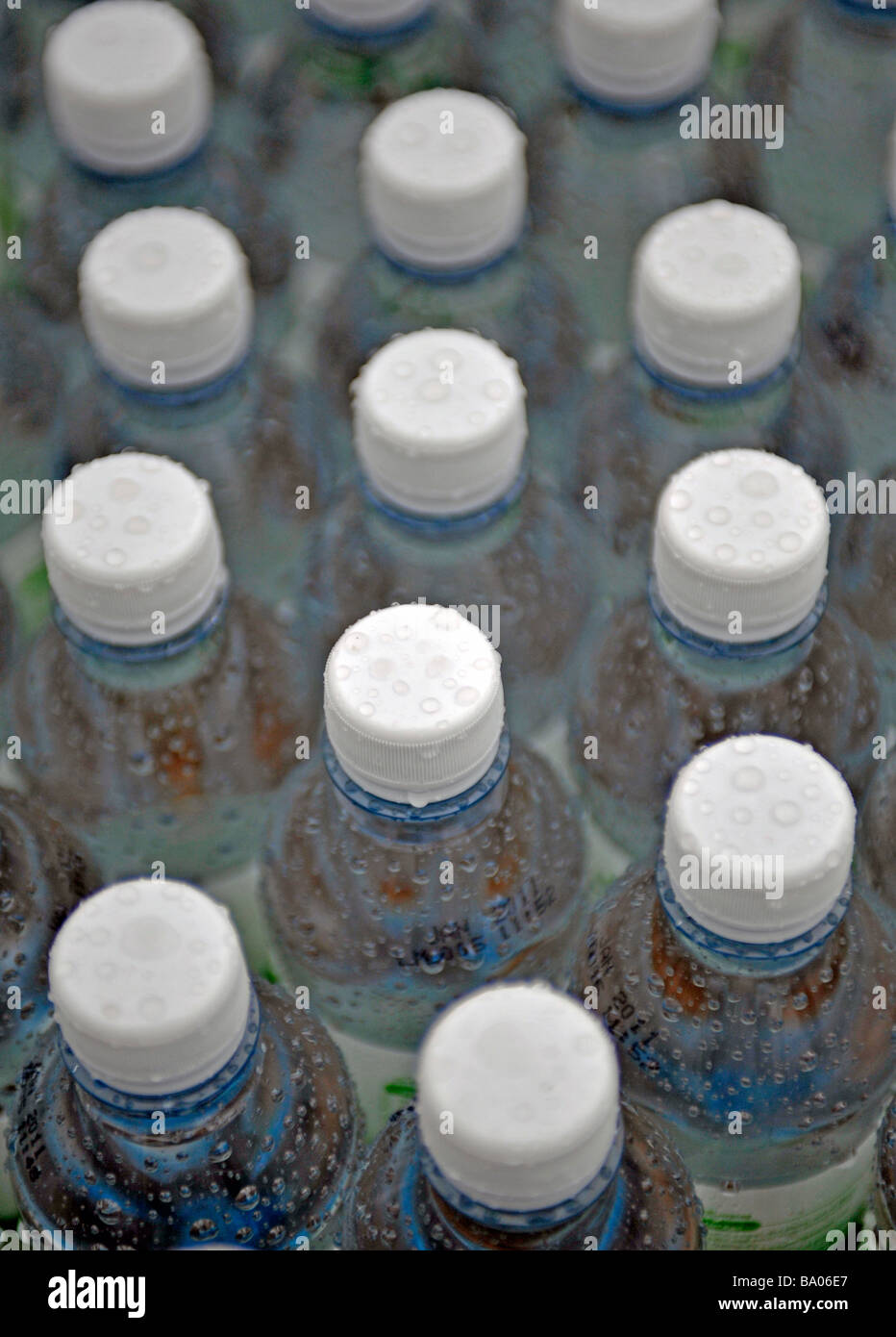 caps on mineral water bottles Stock Photo