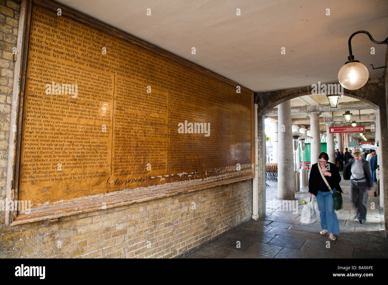 Historic 'Rules, orders and bylaws' public notice in Covent Garden Market, London Stock Photo