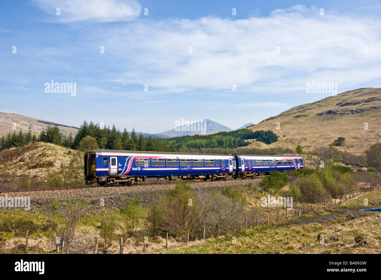 First Scotrail class 156 DMU travelling north towards Tyndrum near Cononish in Scottish West Highlands on its way to Oban. Stock Photo