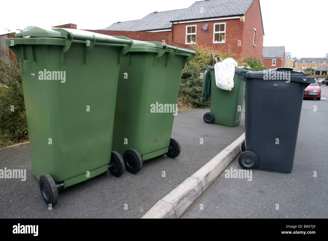 Wheelie bins on a new build housing estate Leeds West Yorkshire England