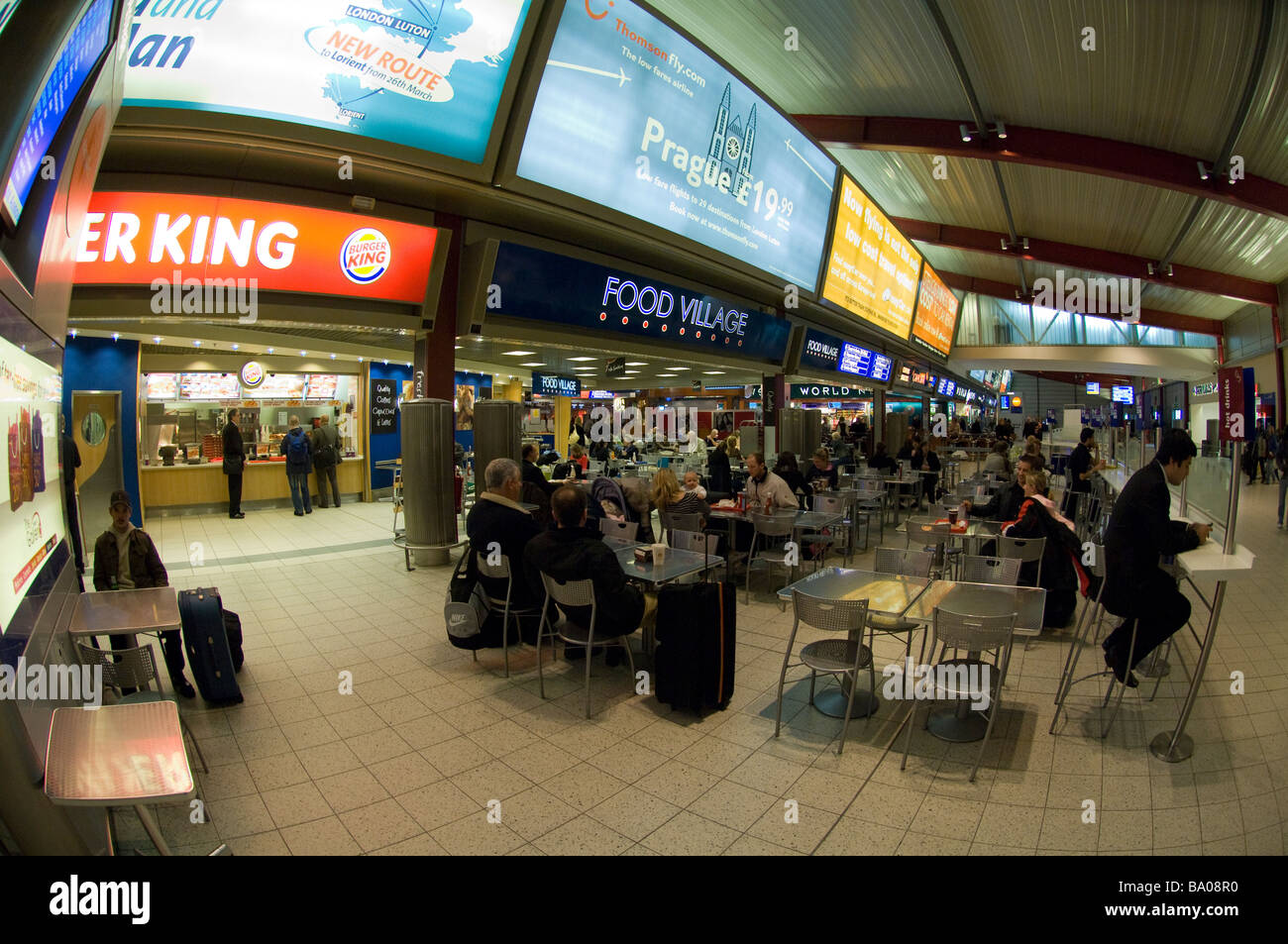 People in departures hall Luton Airport Luton England UK Europe Stock Photo