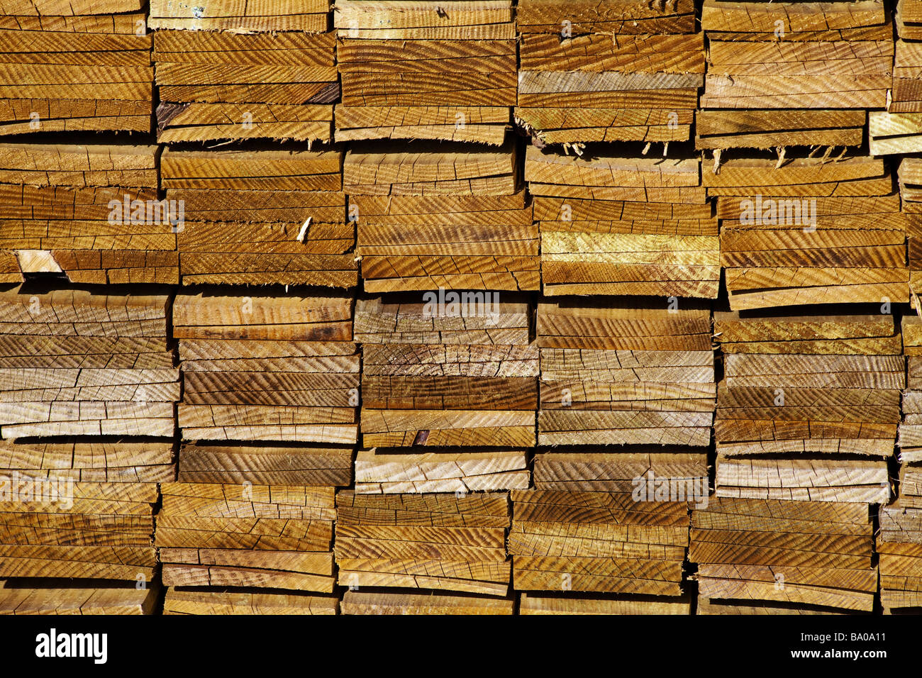 wood and timber in a builders yard Stock Photo Alamy
